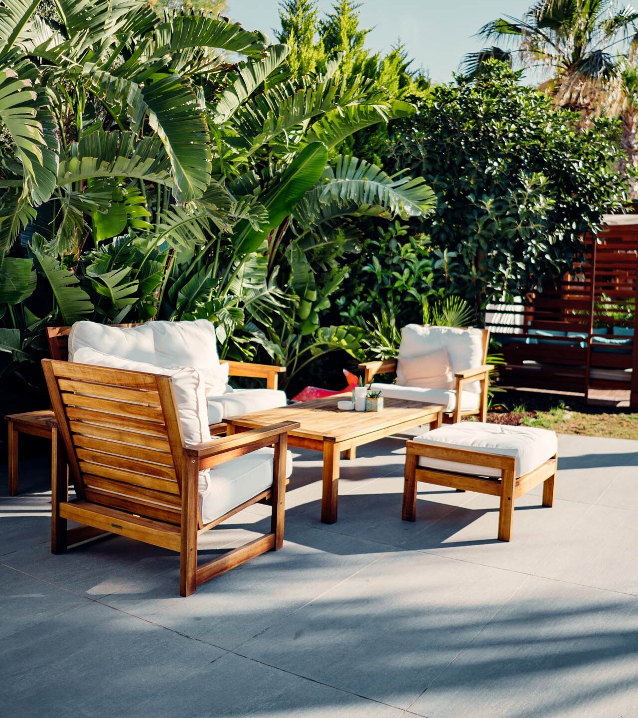 Outdoor seating in a luxurious backyard getaway