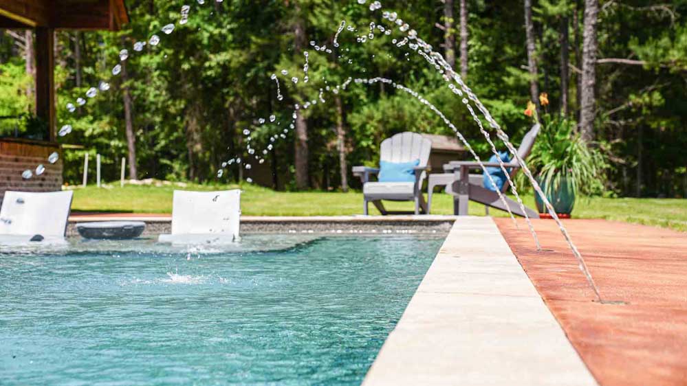A sparkling pool maintained by pool maintenance crew at Aqua + Oak in northern Mississippi.